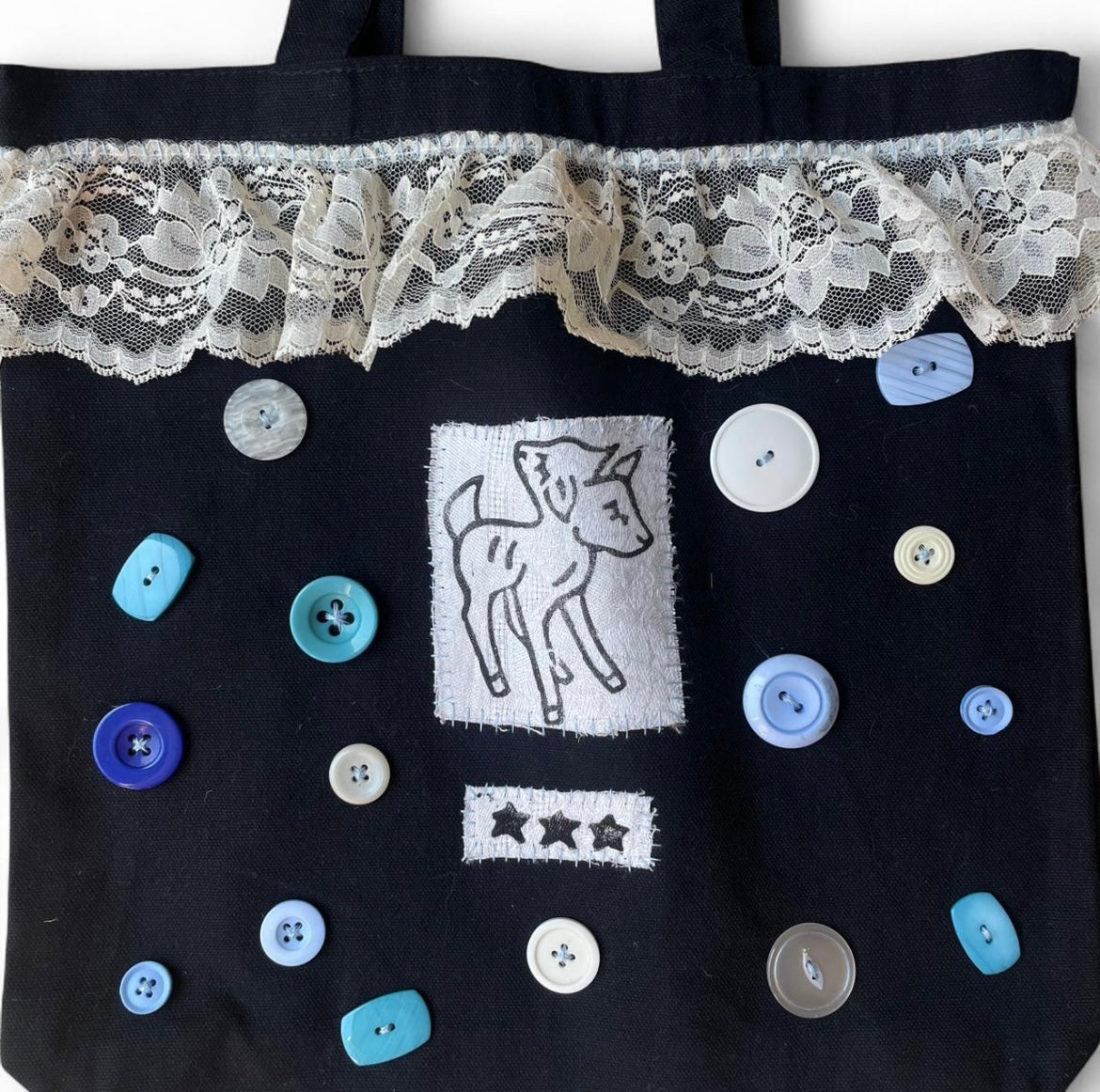 double headed lamb blue buttons L bag