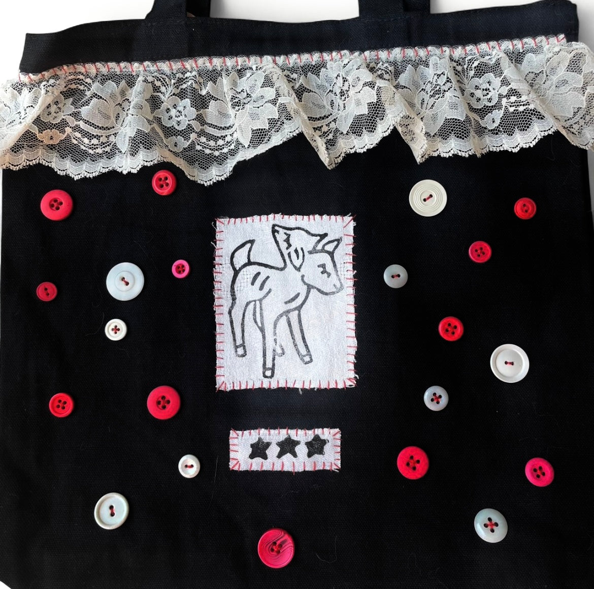 double headed lamb red button L tote bag